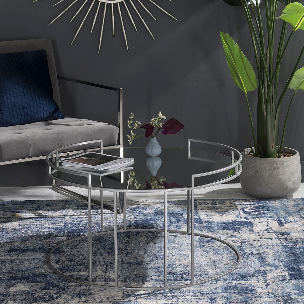 Product photograph of Torrance Glass And Silver Round Coffee Table from Choice Furniture Superstore.